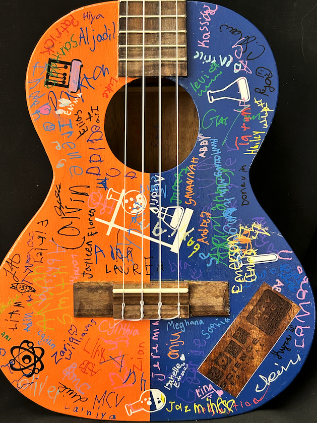 A picture of a signed ukulele